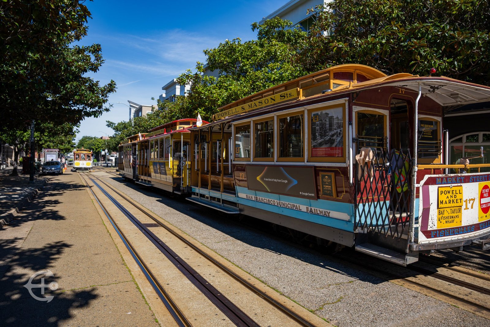 San Francisco cable car photographed on a sunlit street
